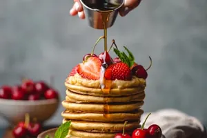 Strawberry Banana Pancakes — IHOP menu item with price $10.49